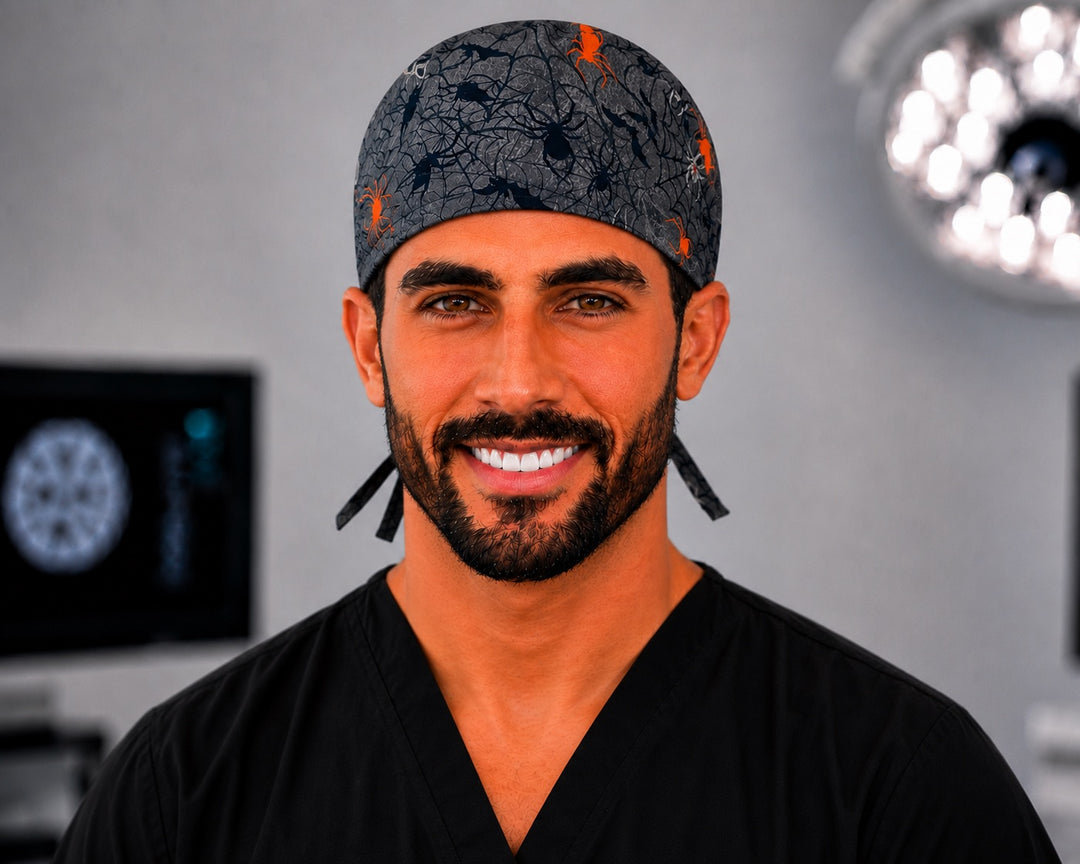 Halloween spider scrub cap for men, charcoal tie-back surgical hat with spiders and webs, front view