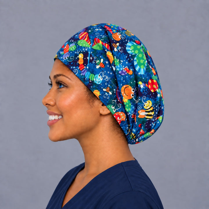 Happy bugs Euro cap, left side profile — handmade blue insect print surgical cap, USA made