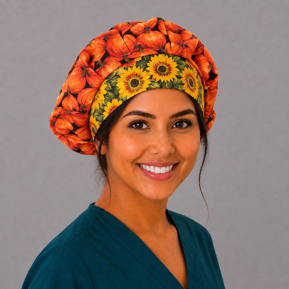 Harvest pumpkin bouffant cap for women, angled smiling view — handmade autumn surgical cap, USA made
