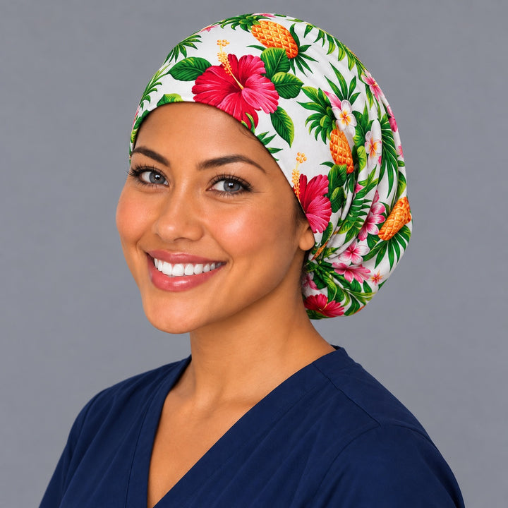 Hawaiian floral Euro surgical cap, left angled view — elastic adjustable back that secures long or thick hair