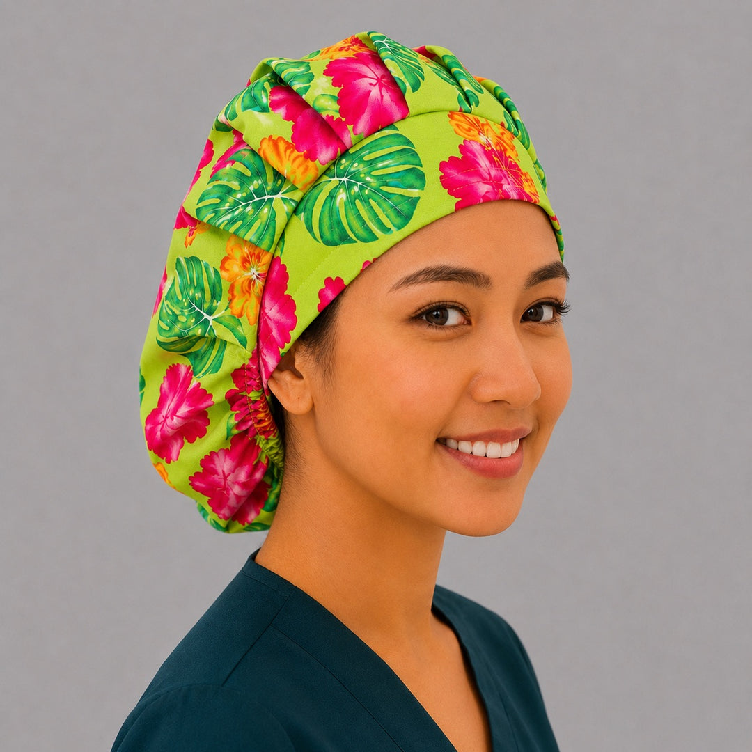 Hawaiian hibiscus bouffant scrub cap back view showing full print of pink hibiscus, bird of paradise and palm leaves on lime green, OR World tropical surgical hat