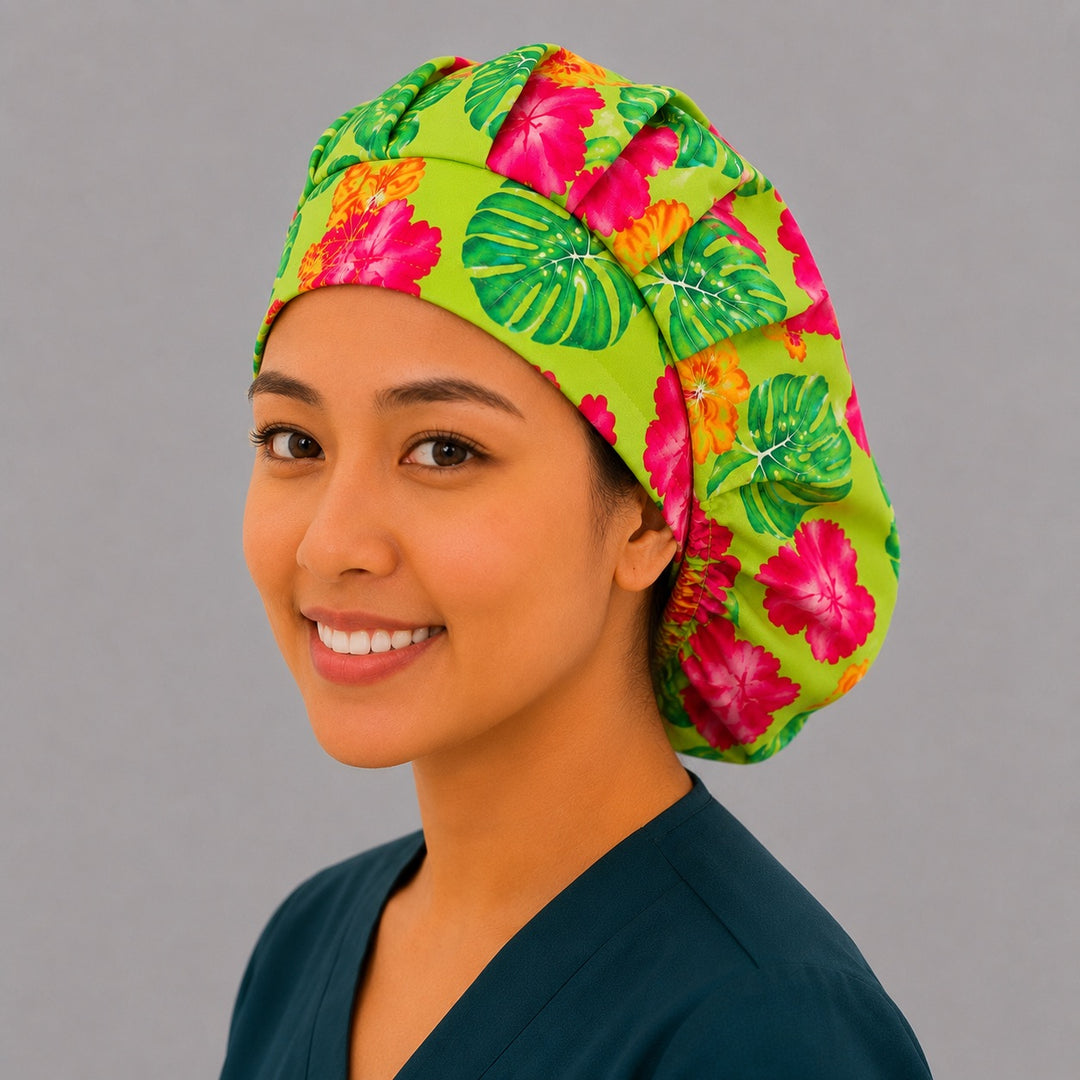 Hawaiian hibiscus bouffant scrub cap for women, front view, pink and orange tropical hibiscus and monstera leaves on lime green, handmade surgical hat by OR World