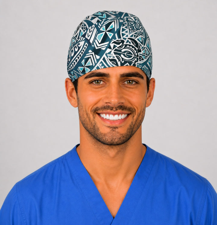Three-quarter view of the Hawaiian sea turtle scrub cap showing the tribal Honu print in teal, navy and white