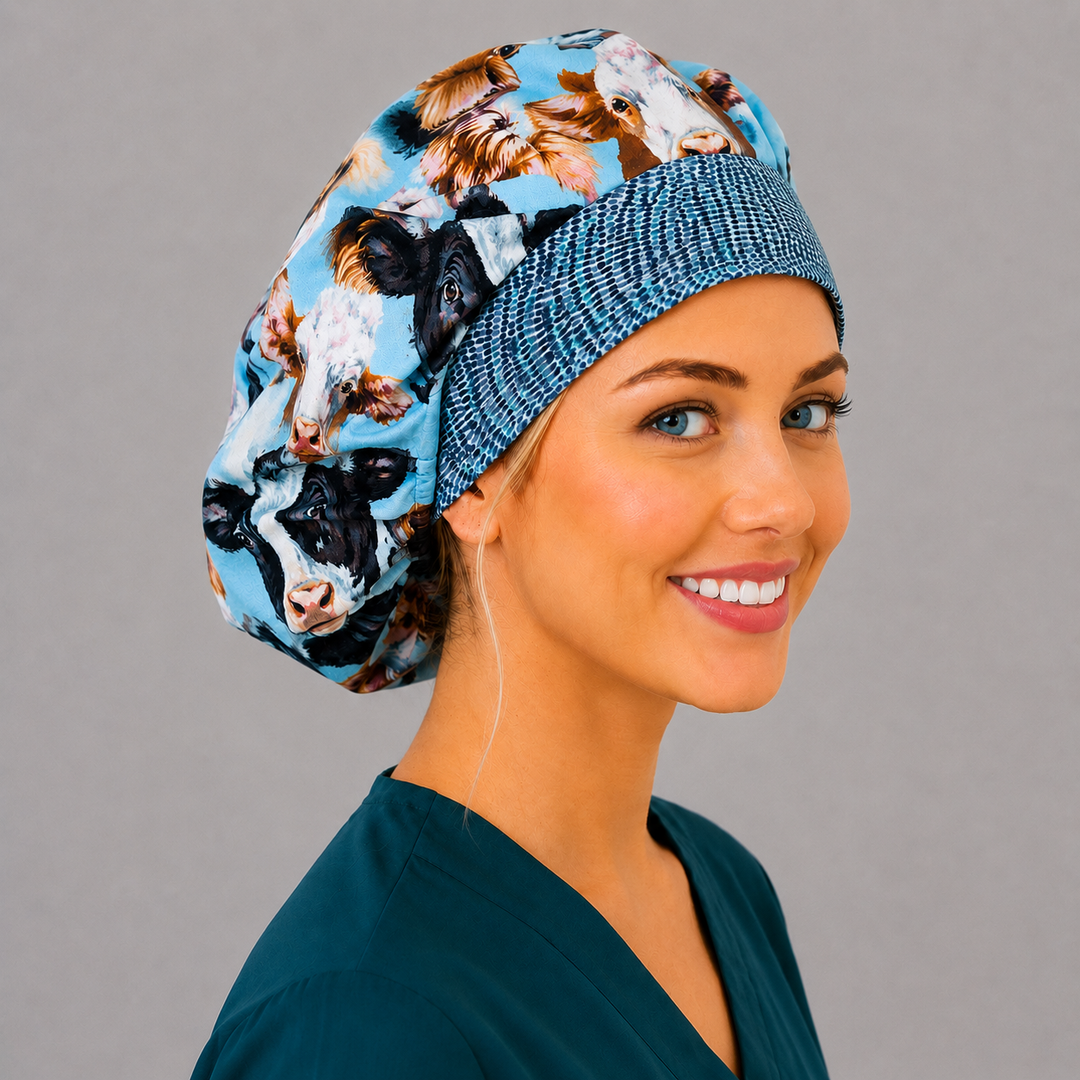 Highland cow farm animals bouffant scrub cap right three-quarter angle on smiling model showing Highland cows and Herefords on sky blue with blue-dot band, OR World vet nurse hat