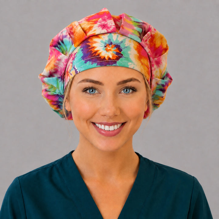 Hippie tie-dye bouffant cap for women, left side profile — handmade retro sunburst surgical cap, USA made
