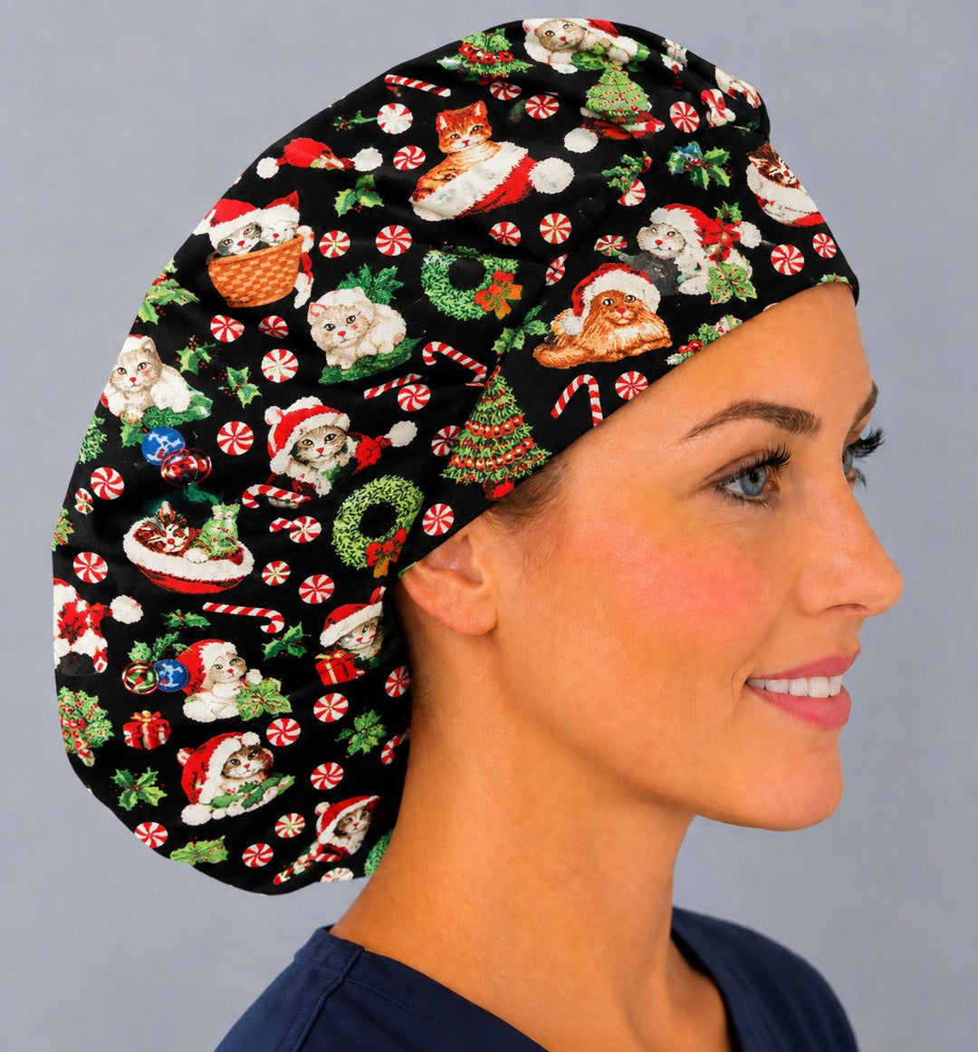 Right side profile of the holiday kitty bouffant surgical hat — peppermint and Christmas tree print, roomy breathable cotton cap for nurses