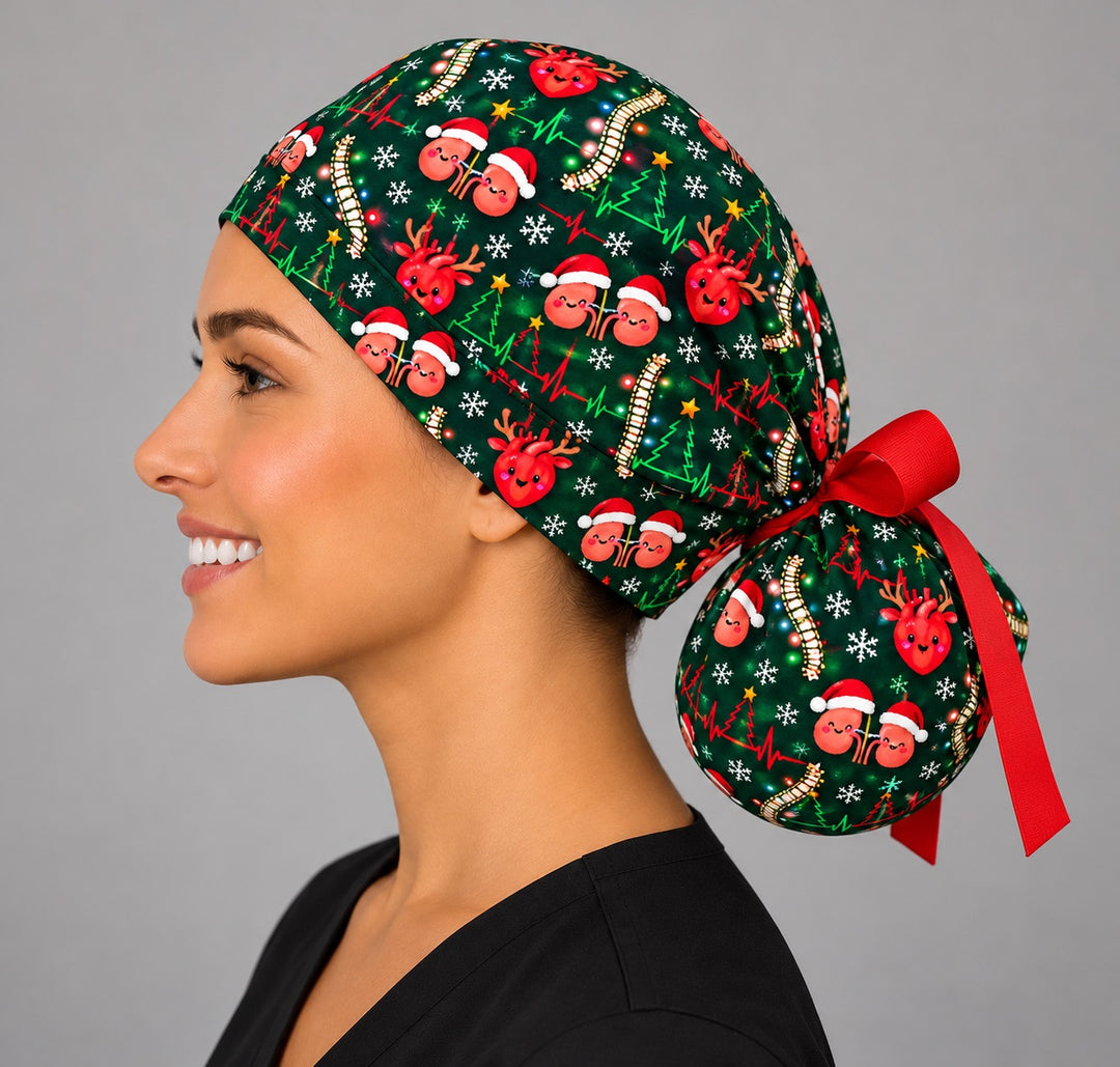 Left profile of a holiday nurse ponytail scrub hat, with Santa-hat kidneys running along the band and snowflakes across the full crown