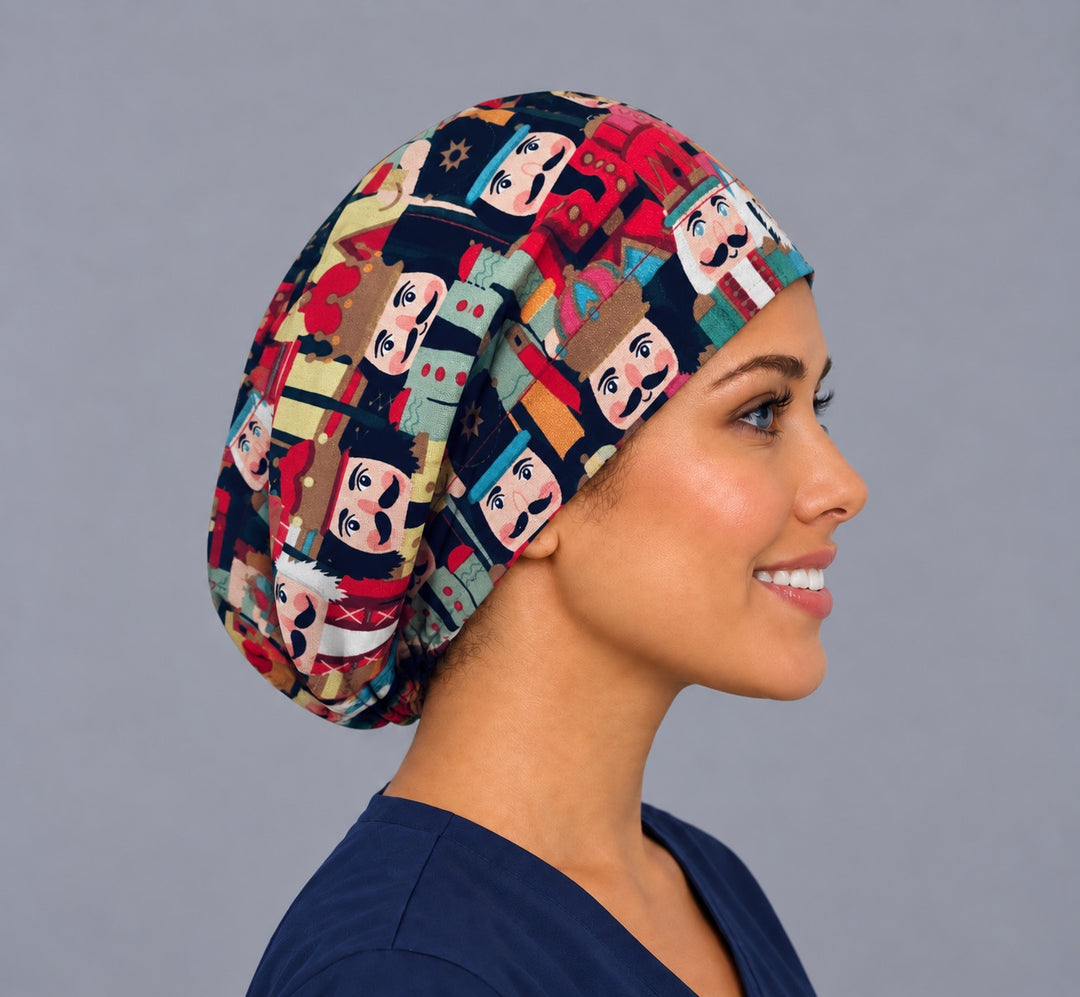 Holiday nutcracker Euro cap, left side profile — navy Christmas print, breathable cotton cap for OR nurses