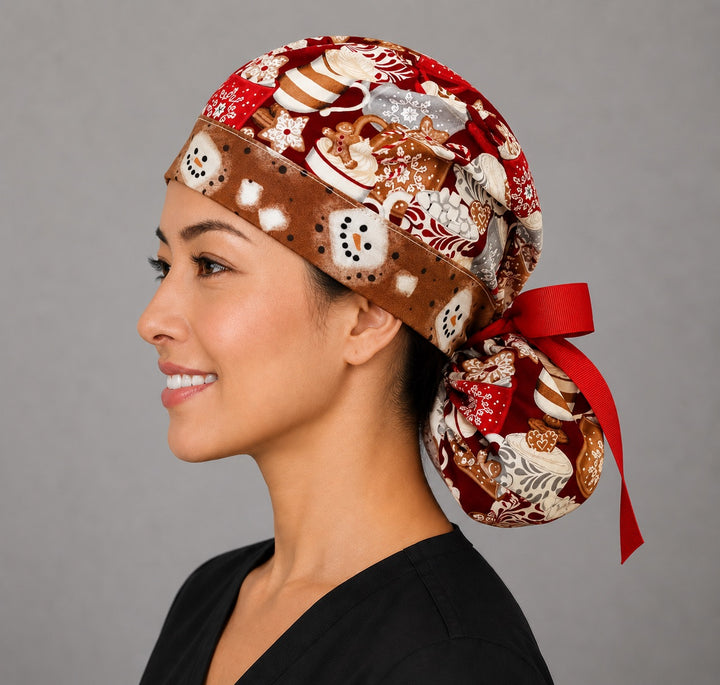 Hot chocolate ponytail surgical cap left side profile showing gathered ponytail pouch of cocoa mugs and gingerbread with snowman band and red ribbon tie