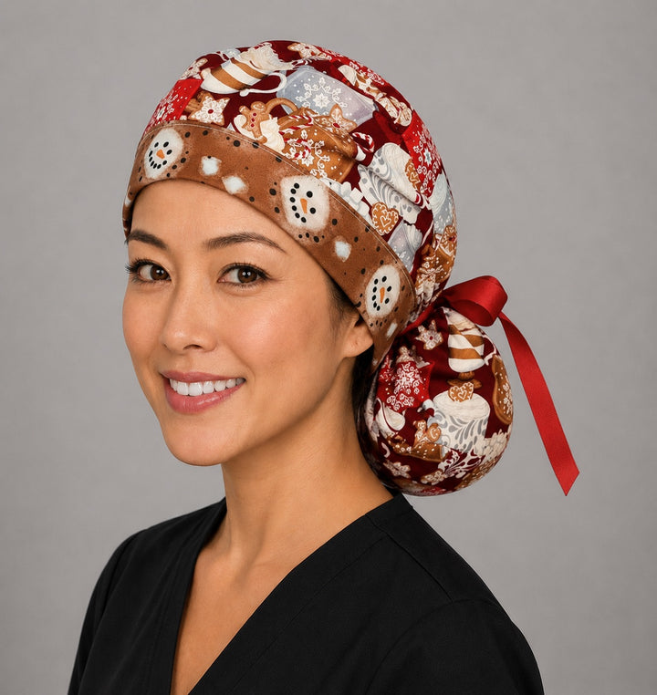 Hot chocolate ponytail nurse cap left three-quarter angle on smiling model showing cocoa mugs, gingerbread, marshmallows and snowman band with red ribbon bow