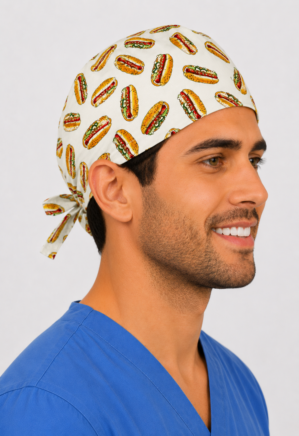 Profile view of man wearing funny hotdog tie-back scrub cap — handmade-in-USA men&