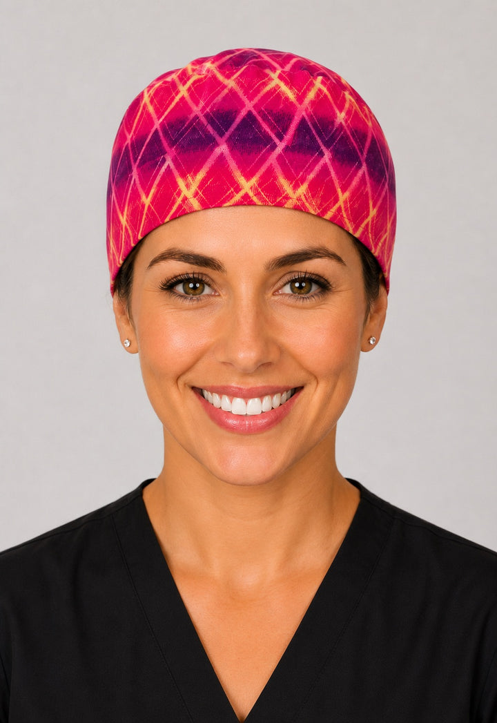 Three-quarter view of hot pink and purple tie dye unisex adjustable surgical hat for nurses and surgical techs