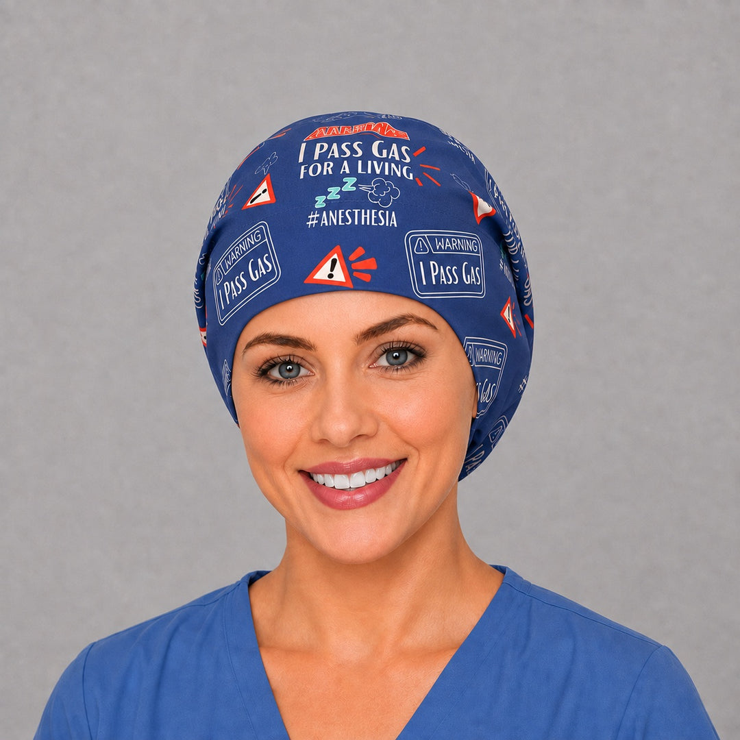 Woman wearing an I Pass Gas For A Living Euro scrub cap, front view — funny anesthesia warning print on royal blue, adjustable surgical hat