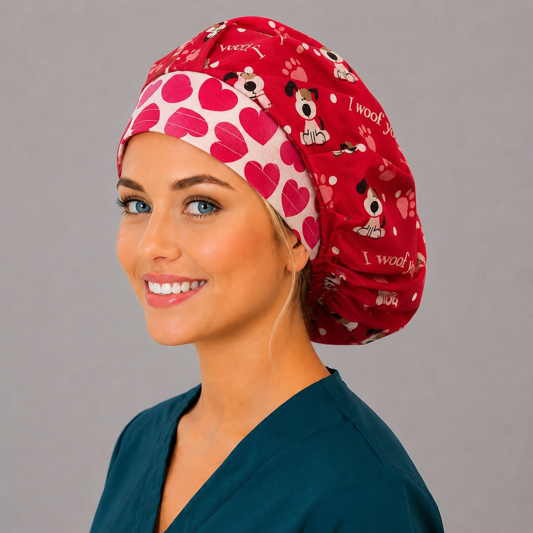 Flat-lay of the I Woof You bouffant scrub cap — red fabric detail showing puppies, pink paw prints and hearts for Valentine's Day