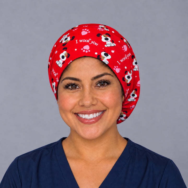Right side profile of the I Woof You puppy Euro surgical hat — pink paw print, breathable cotton cap for vet techs
