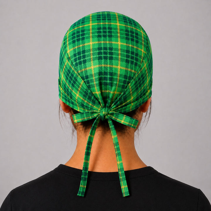 Three-quarter view of Irish tartan green plaid unisex adjustable surgical hat for nurses, surgical techs and vet techs