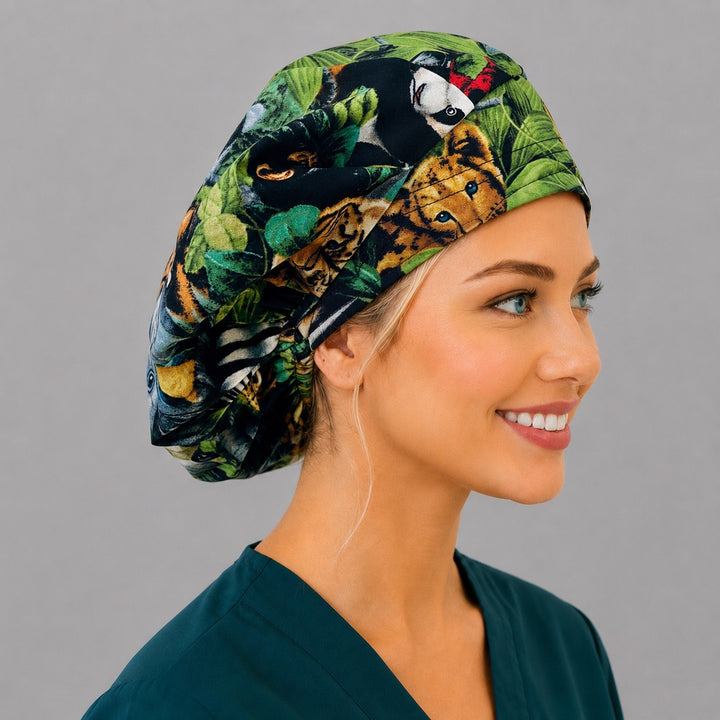 Side view of the jungle animal print bouffant cap — leopard, tiger and toucan on green foliage, roomy cotton surgical cap for vet techs