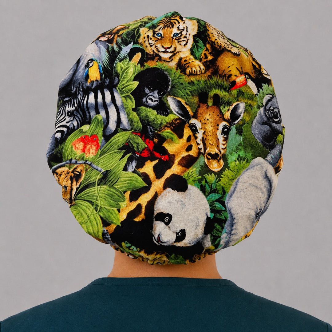 Back view of the jungle safari bouffant scrub cap showing the full roomy fit — tiger, zebra, gorilla, giraffe and panda wildlife print