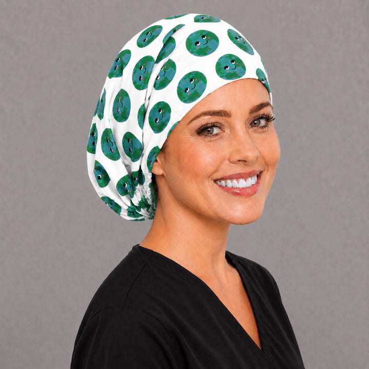 Kawaii earth globe Euro scrub cap, right angled smiling view — eco-friendly print for surgical techs and vet teams