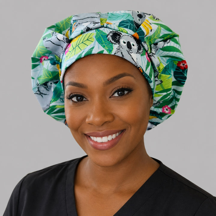 Koala bears tropical leaves bouffant scrub cap for women, front view, koalas among eucalyptus and hibiscus, handmade surgical hat by OR World