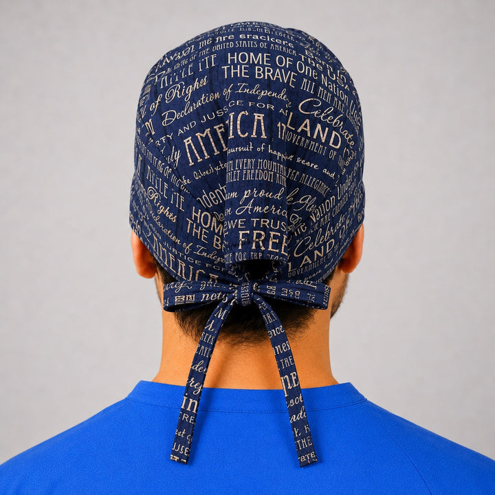 Back view of adjustable tie-back knot on navy Land of the Free patriotic unisex surgical hat