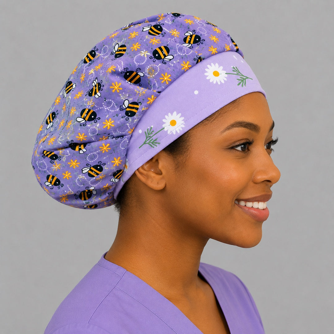 Side view of the lavender bee floral bouffant surgical cap — daisy front band and purple honeybee print, breathable cotton cap for OR nurses
