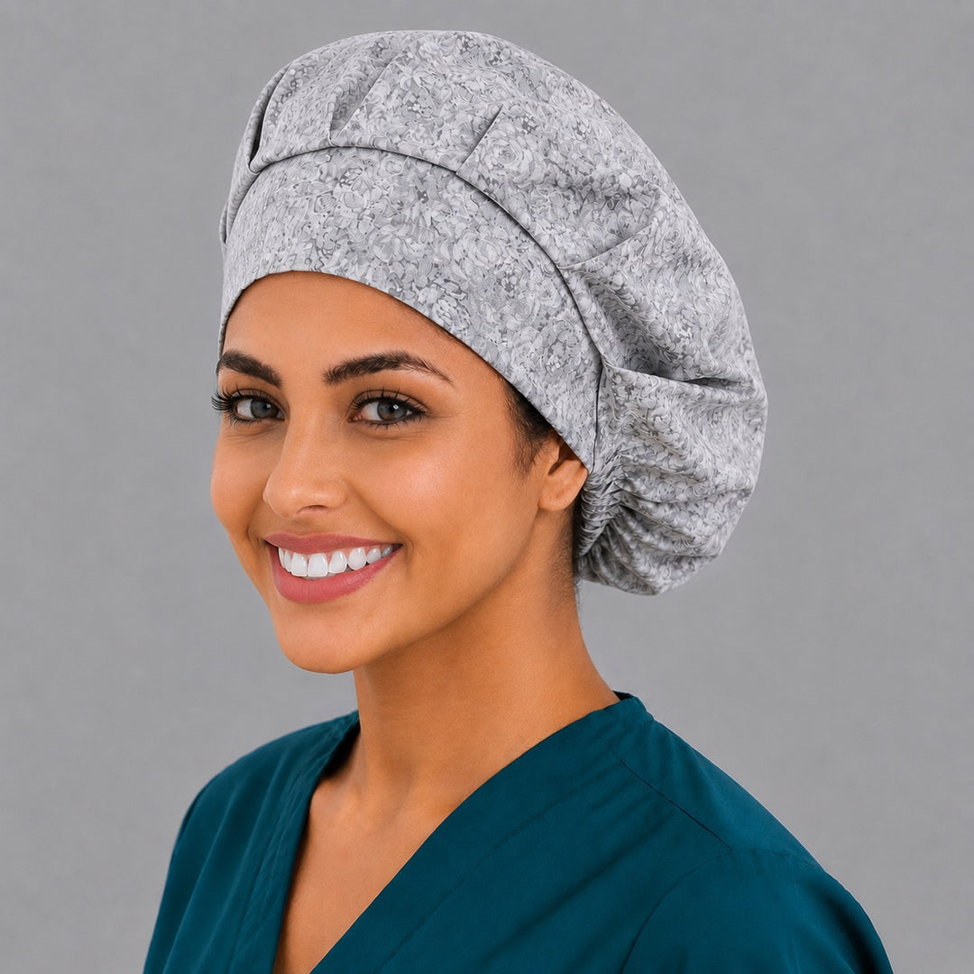 Light gray bouffant surgical cap for long hair, left angled view — deep gathered fit that secures thick or braided hair