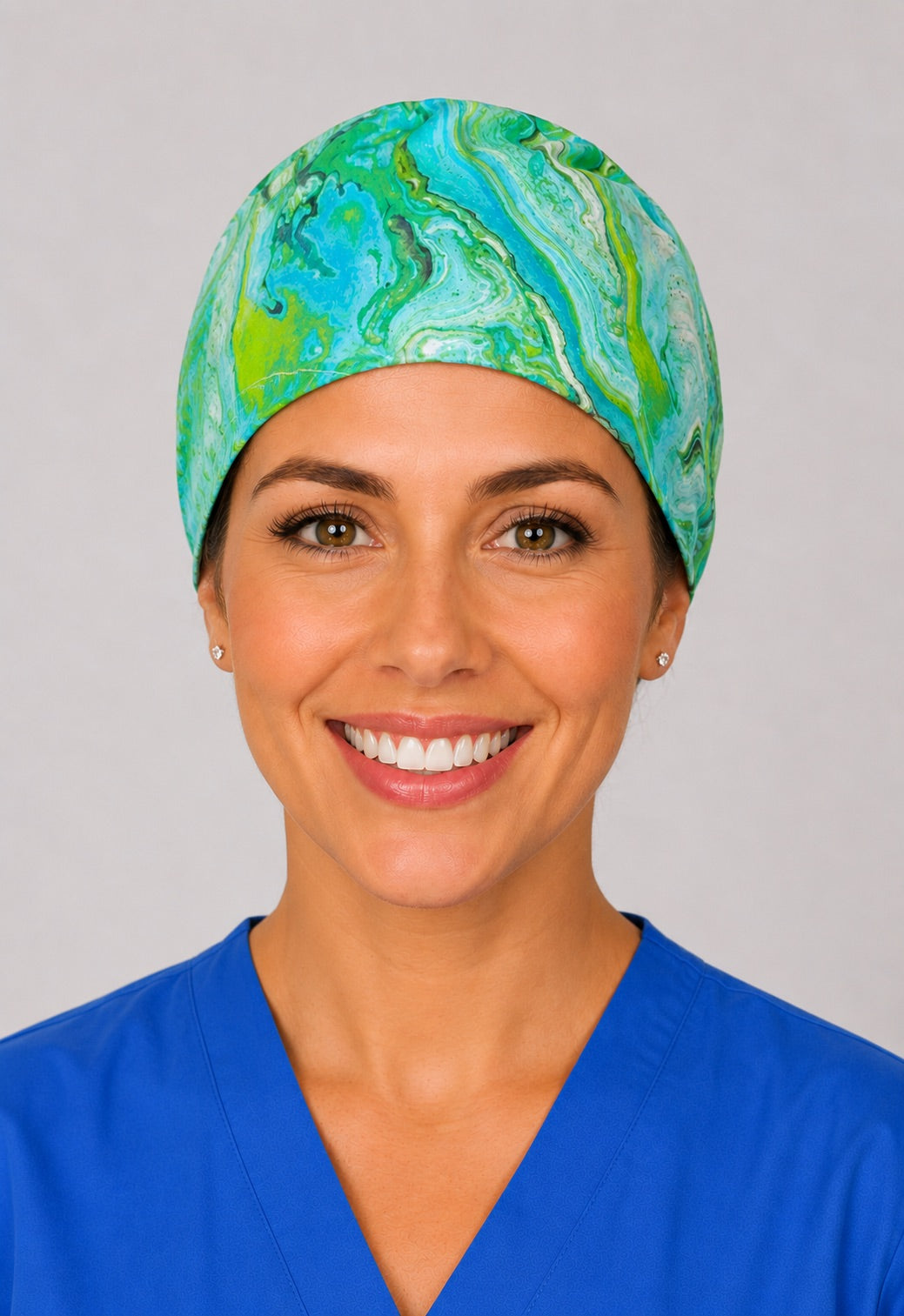 Left profile of limestone swirl scrub cap for women with short hair, green marbled OR cap