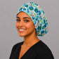 Love Your Planet Earth Day Euro scrub cap, three quarter view on a model, adjustable handmade USA surgical hat for women and OR nurses.