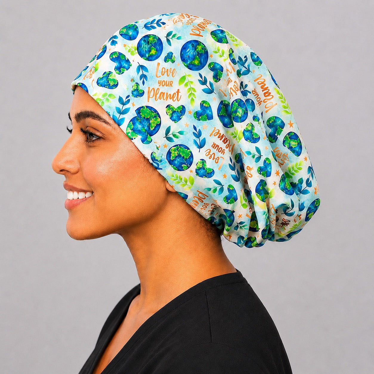 Side profile of Love Your Planet Euro scrub cap with room for long hair, handmade in USA OR World surgical hat for women.