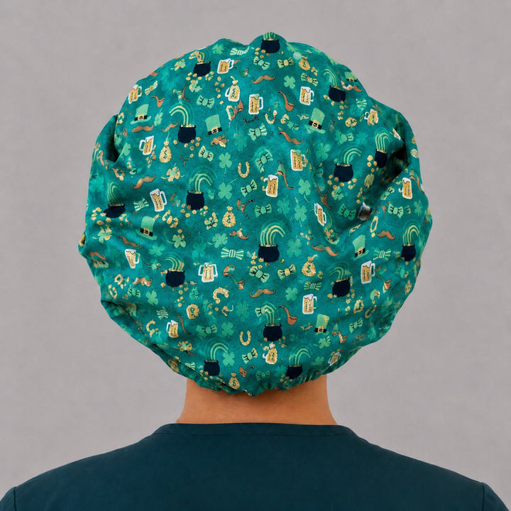 Side view of the lucky clover bouffant surgical hat — rainbows, horseshoes and leprechaun hats with glittering shamrock band, roomy cotton cap