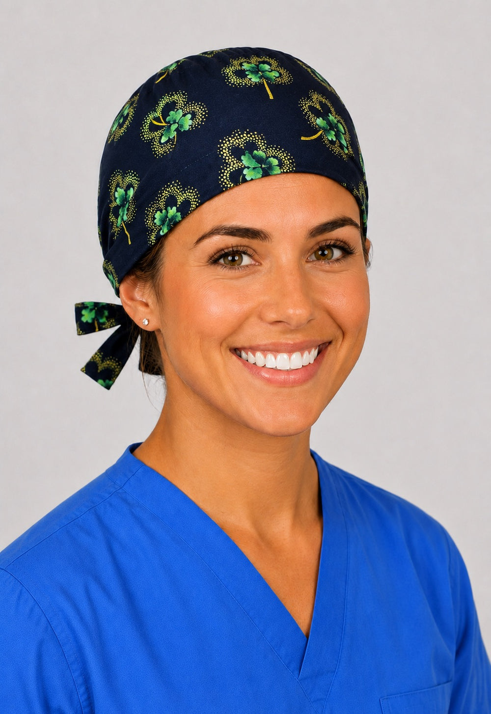 Left profile of lucky clover scrub cap with gold accents for women with short hair, St. Patrick's OR cap