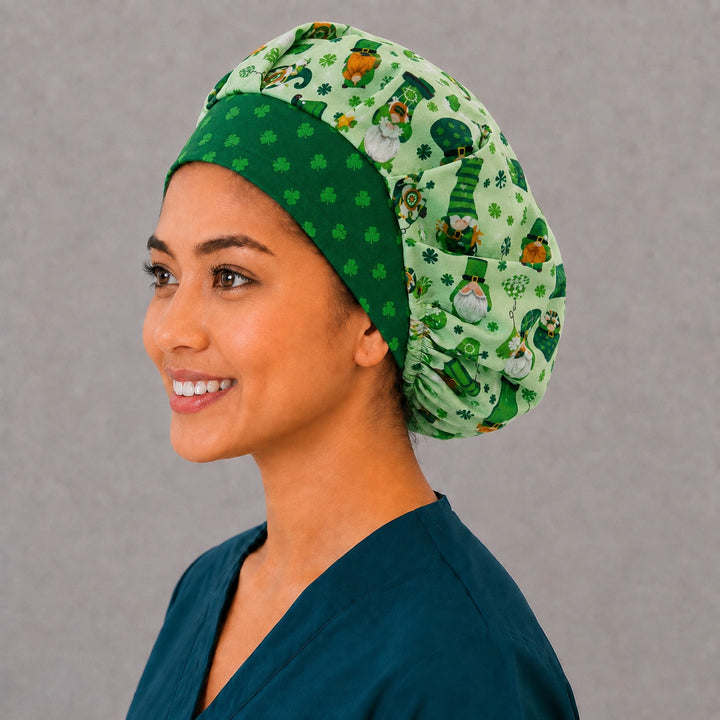 Left side profile of the lucky gnome bouffant surgical hat — emerald clover band and mint green gnome print, roomy breathable cotton cap for nurses