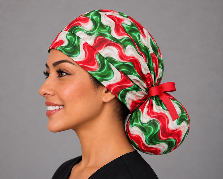 Left profile of a marble swirl scrub cap for long hair in 100% cotton, showing full coverage from hairline to ponytail and the wave print across the side