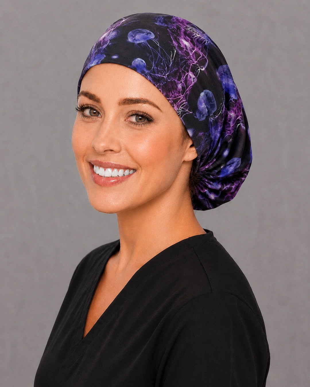 Marine life jellyfish Euro surgical cap, left angled view — elastic adjustable back with full head coverage for long hair