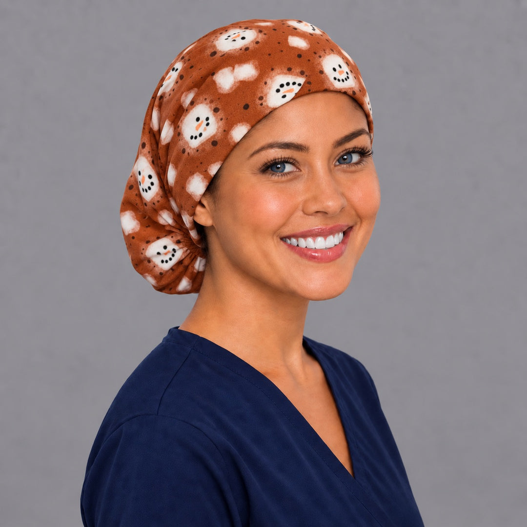 Marshmallow face Euro scrub cap, right angled smiling view — carrot nose snowman print for OR nurses and surgical techs