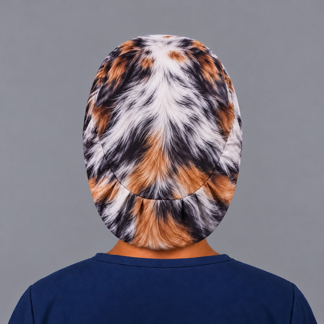 Back view of a merle fur print euro scrub cap showing the gathered elastic back, Kona cotton custom made surgical hat for vet techs and surgical techs