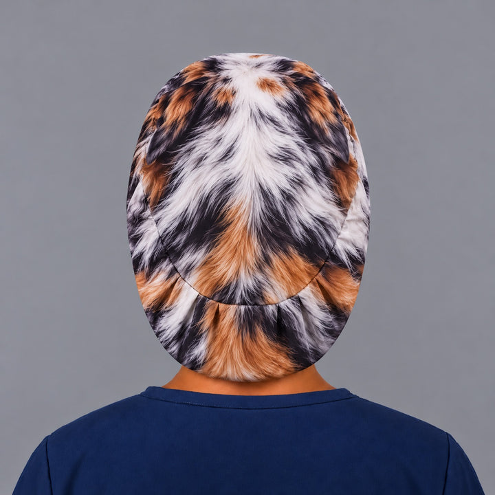 Back view of a merle fur print euro scrub cap showing the gathered elastic back, Kona cotton custom made surgical hat for vet techs and surgical techs