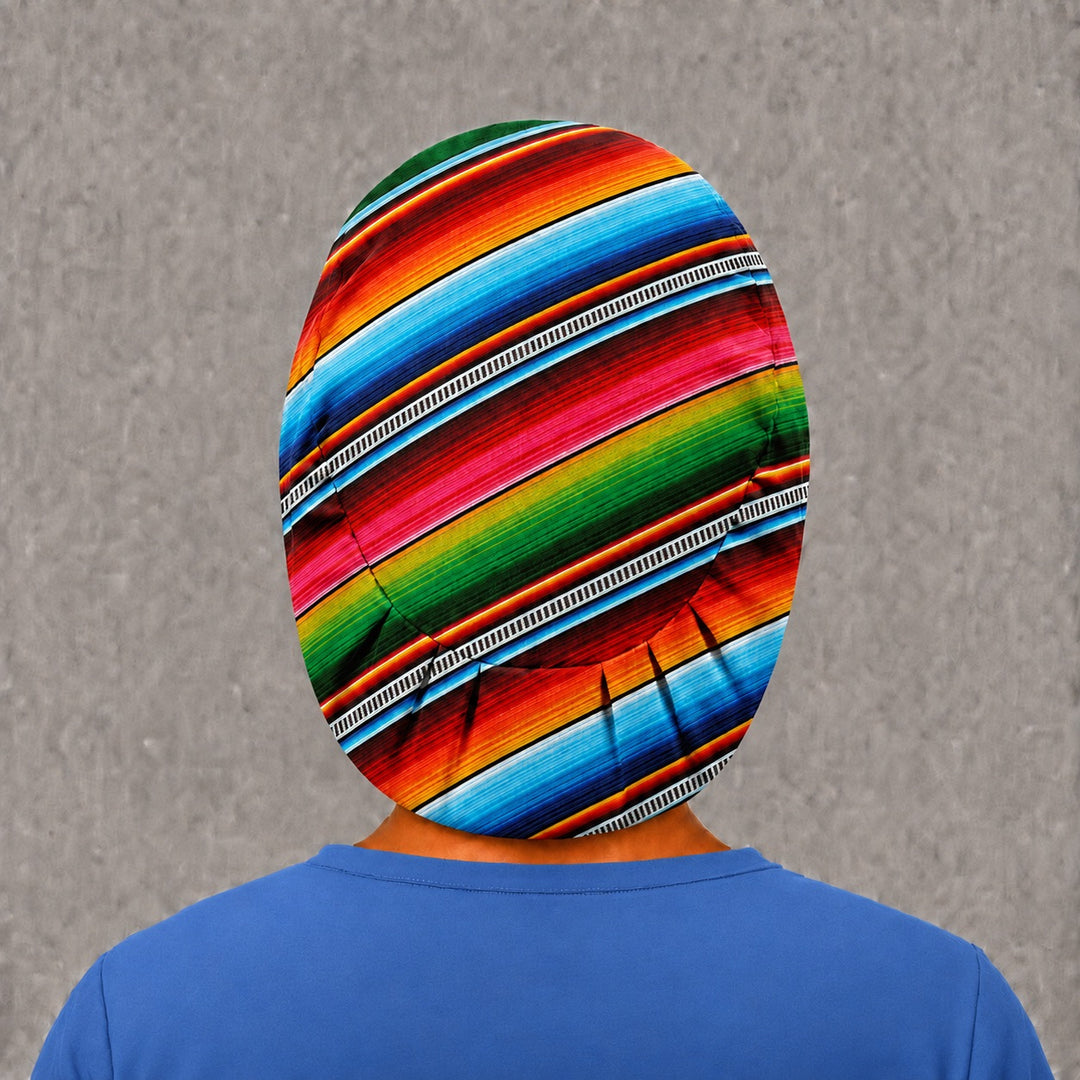 Mexican blanket stripe Euro scrub cap, right angled smiling view — festive fiesta print for Latina nurses and surgical techs