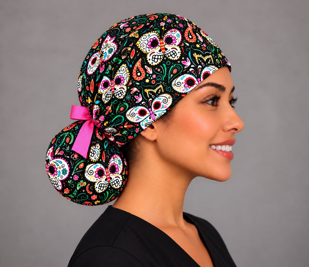 Right profile of the Mexican butterfly ponytail scrub cap on a surgical tech, round bun pouch and pink bow, handmade in the USA