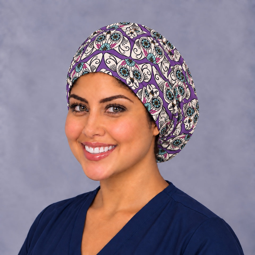 Mexican calavera cat Euro surgical hat, left three-quarter view, purple and teal sugar skull print for OR nurses