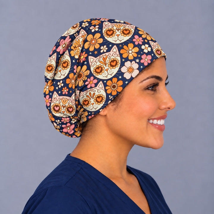 Mexican cat Euro scrub cap, right three-quarter view, gorro quirúrgico de gatitos calavera on navy cotton, handmade in USA