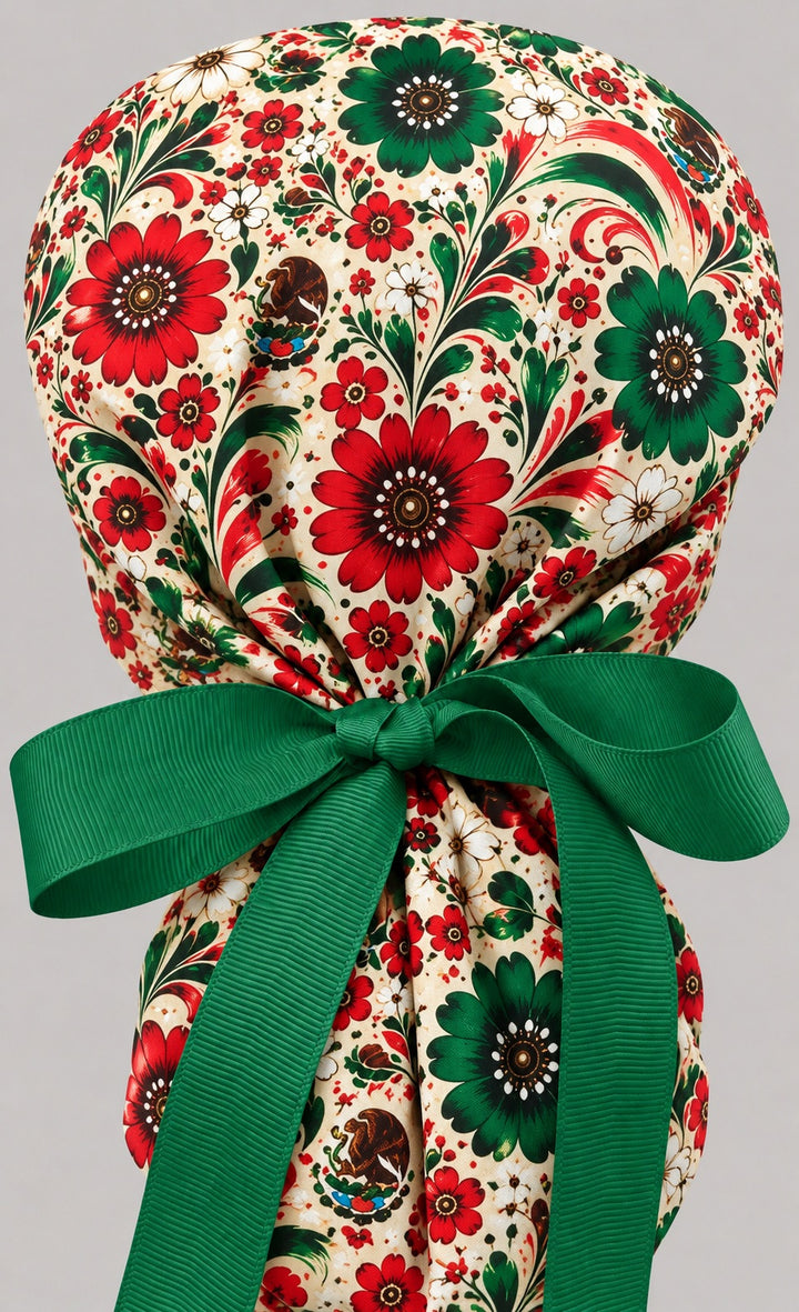 Back of the Mexican floral ponytail scrub cap showing the adjustable green grosgrain bow tie and eagle print
