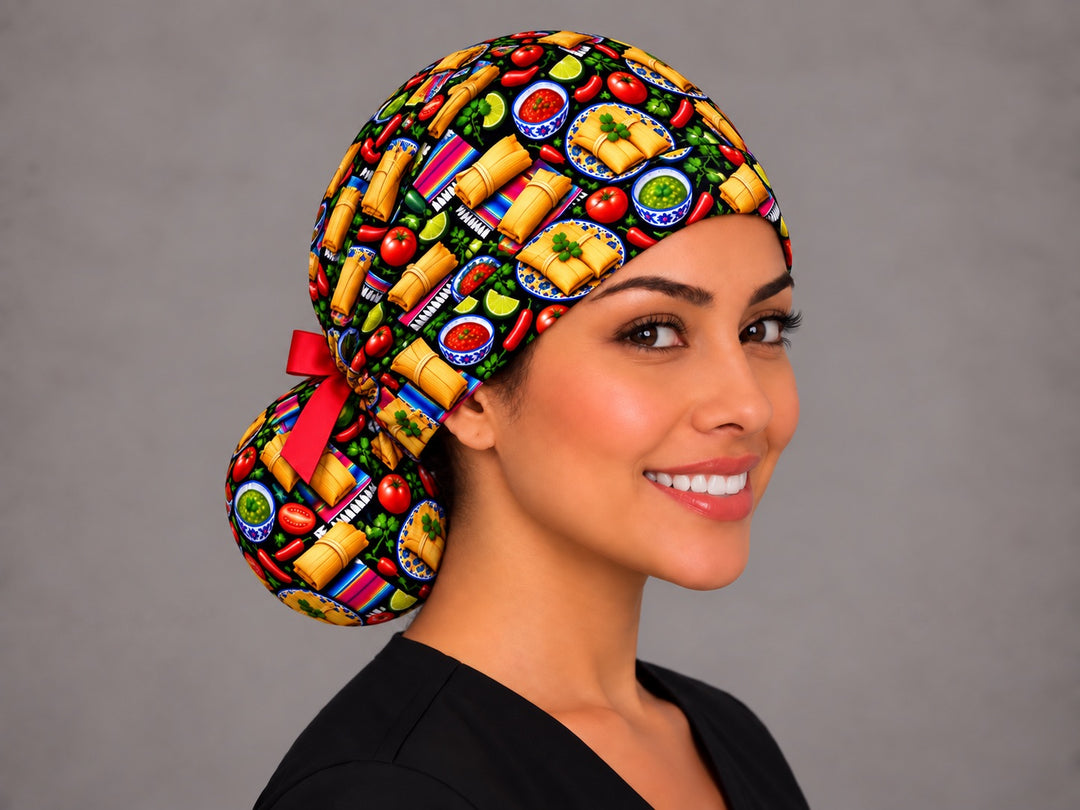 Three-quarter angle of a Mexican food ponytail nurse cap, with bowls of salsa roja, red tomatoes and lime wedges across the gathered crown