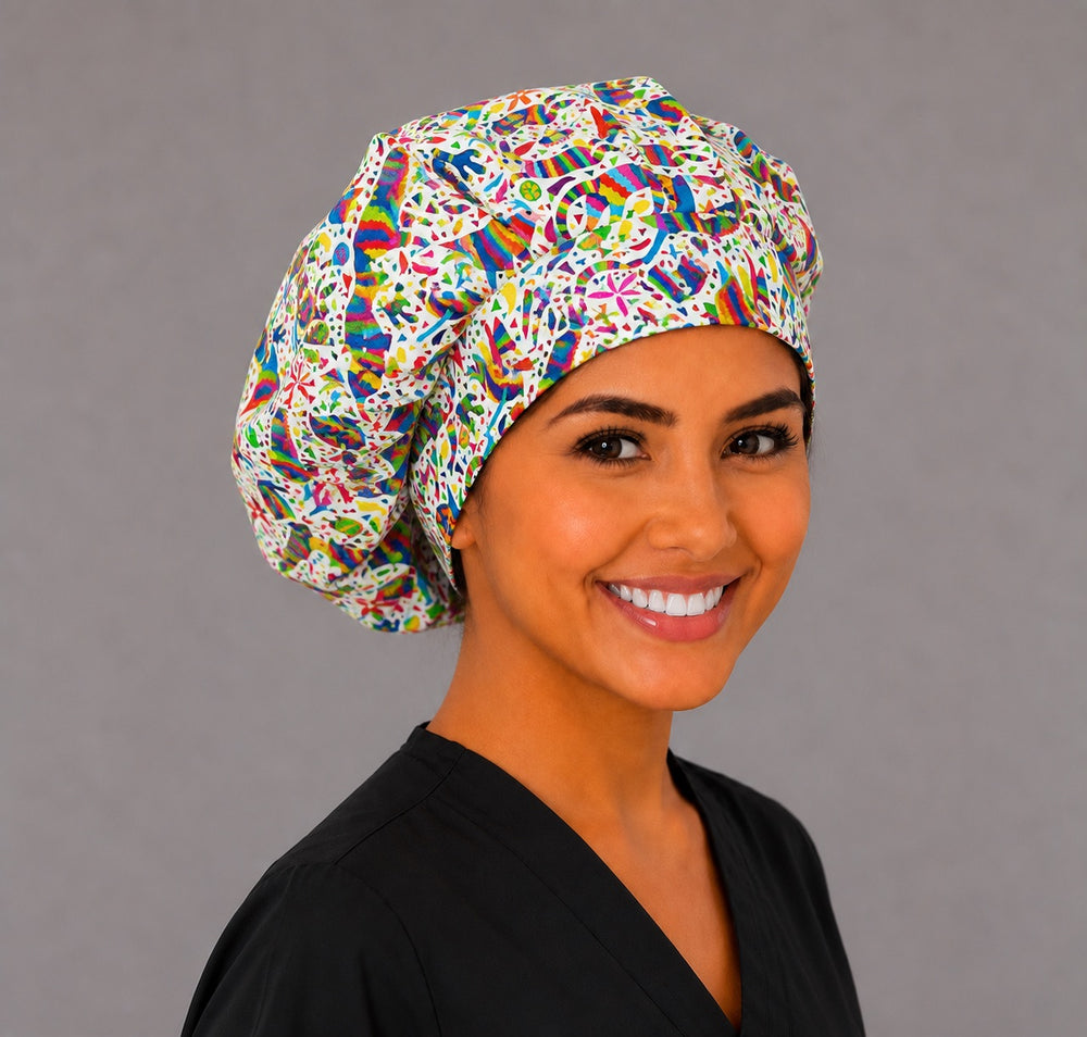Mexican Otomí Tenango fabric swatch, colorful rainbow folk-art animals scrub cap print detail