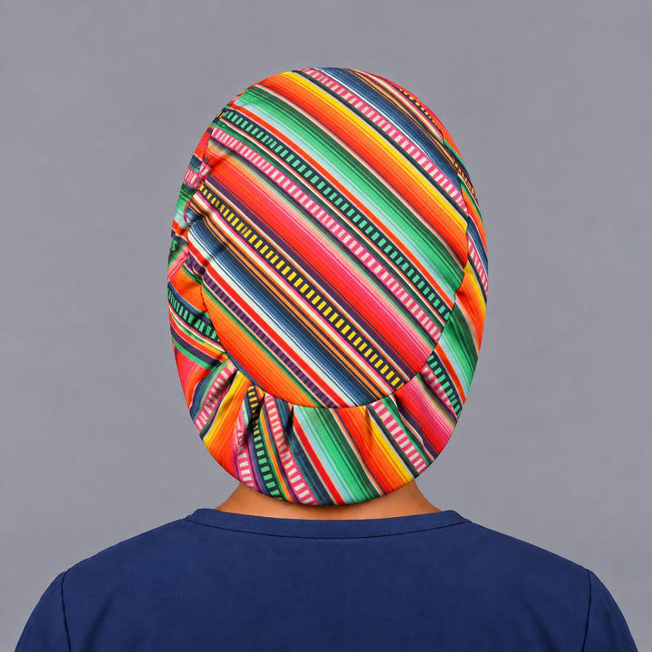 Back of the Mexican serape bouffant cap showing the adjustable elastic back and diagonal stripes