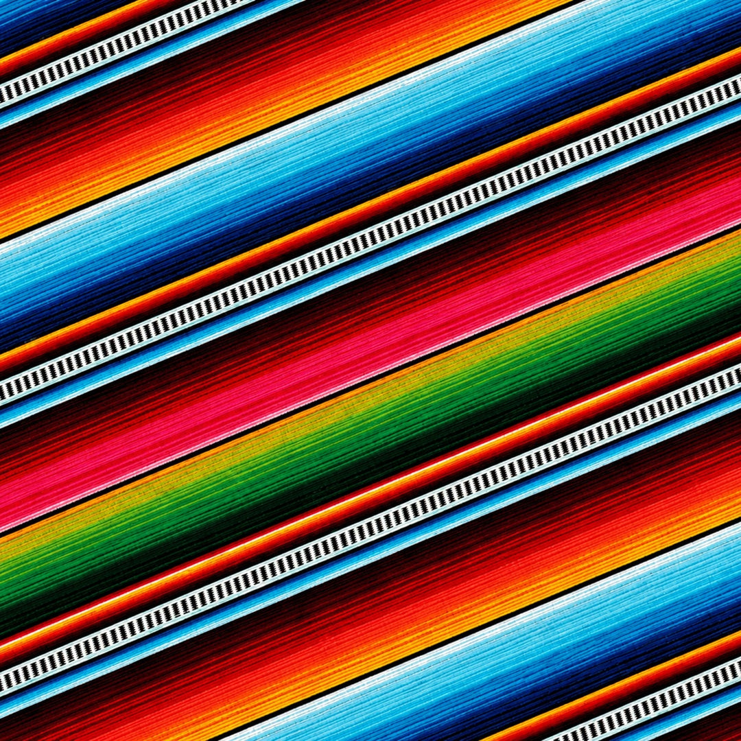 Woman wearing a Mexican serape Euro scrub cap, front view — rainbow sarape blanket stripe, adjustable surgical hat for women