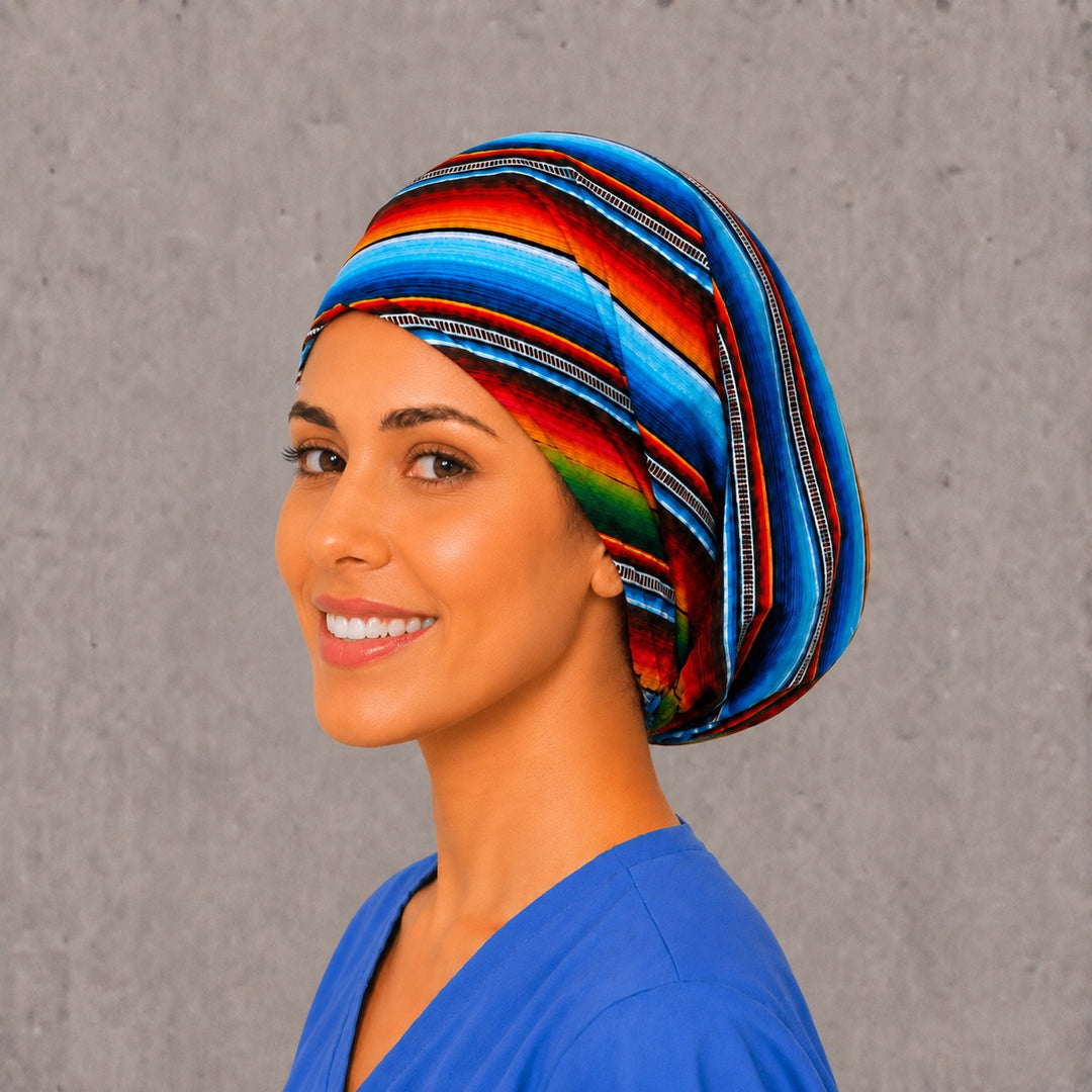 Fabric detail of the Mexican serape scrub cap — close-up of rainbow sarape blanket stripe cotton