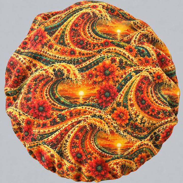 Top crown view of the Mexican sunset bouffant scrub cap — full print of cresting waves and sunsets across the cap