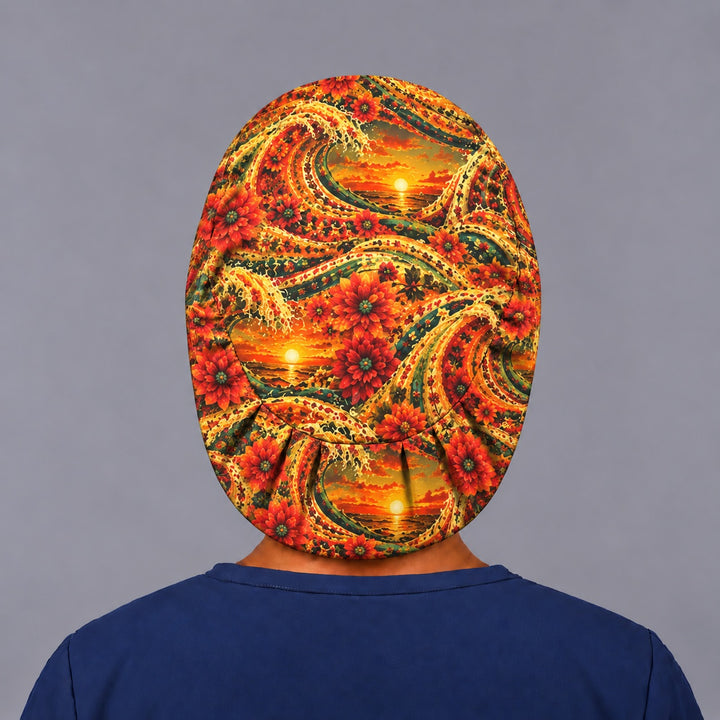Back view of the Mexican sunset Euro scrub cap — elastic gathered back showing sunset waves and dahlias across the crown